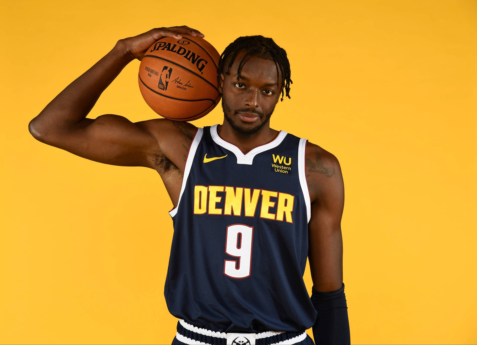 Jerami Grant Denver Holding A Ball Background