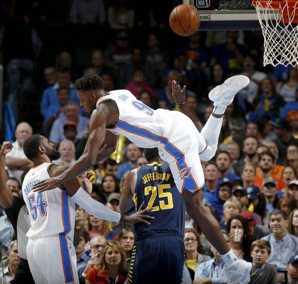 Jerami Grant Falling Over Background