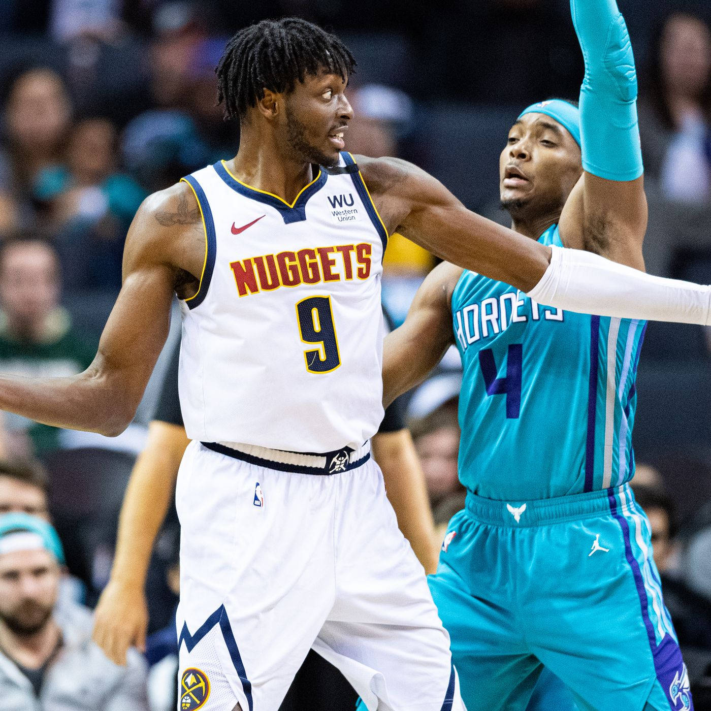 Jerami Grant In Action During His Time With The Denver Nuggets Background