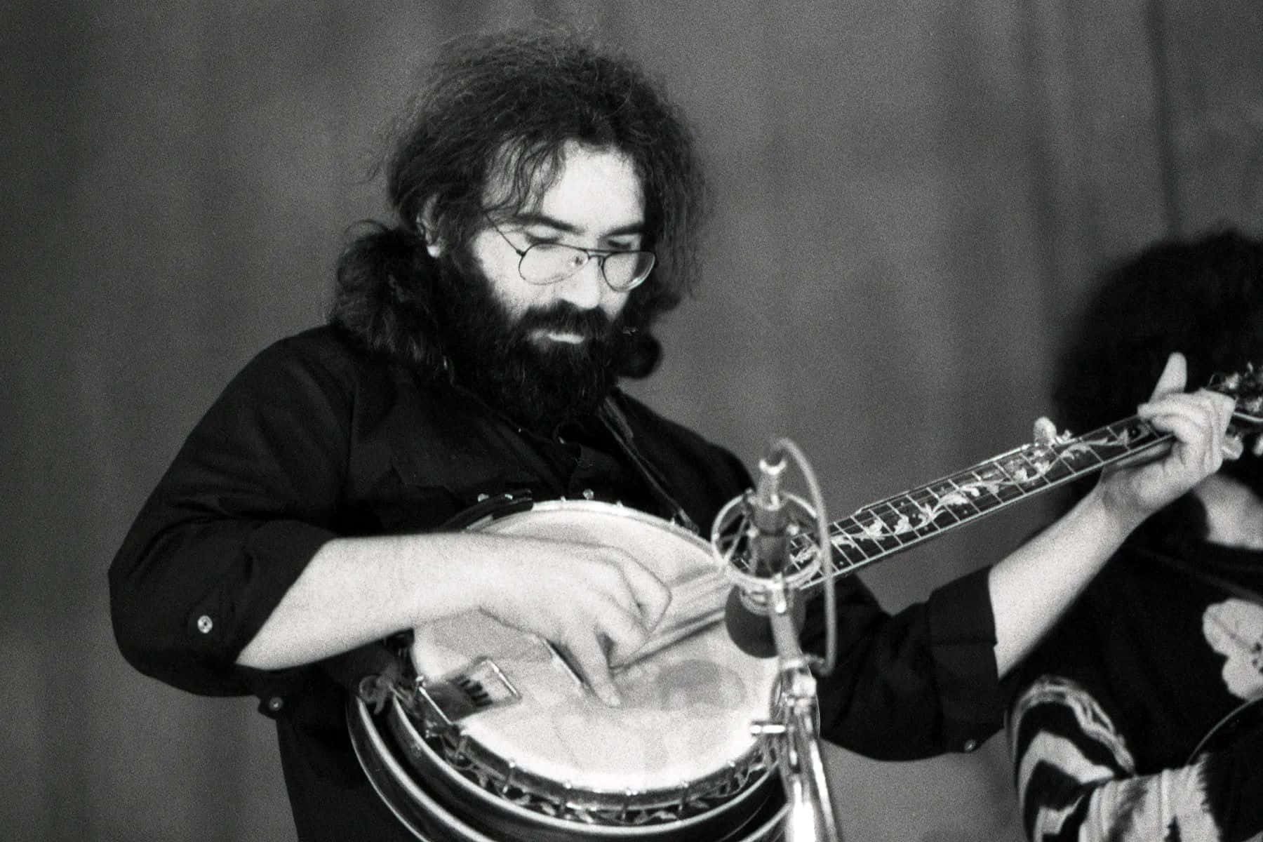 Jerry Garcia Playing Banjo Blackand White Background