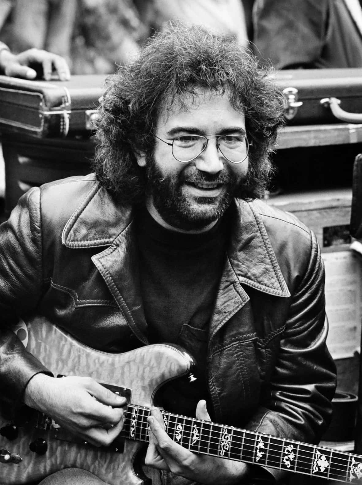 Jerry Garcia Playing Guitar Blackand White Background