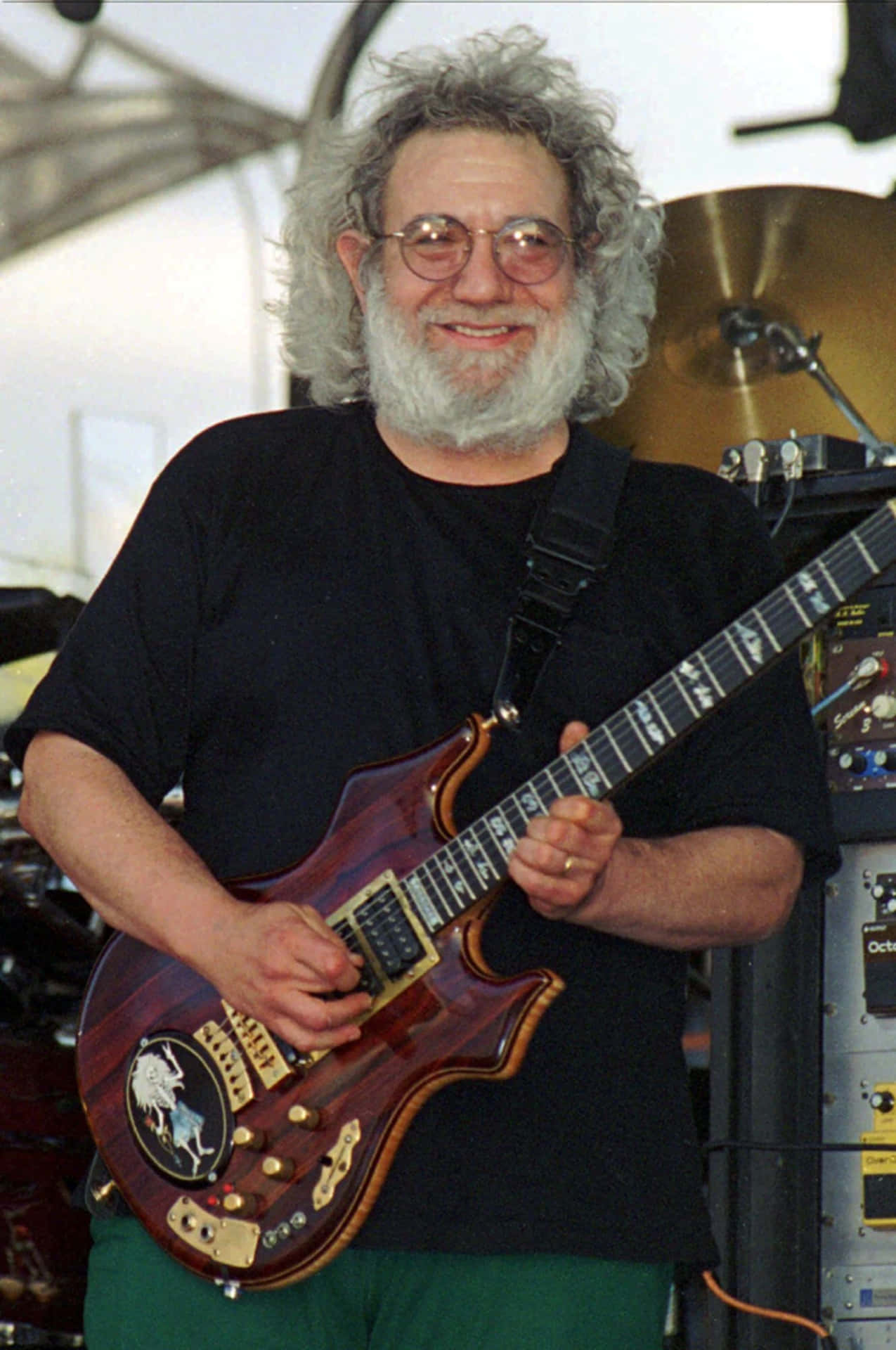 Jerry_ Garcia_ Playing_ Guitar_ Onstage Background