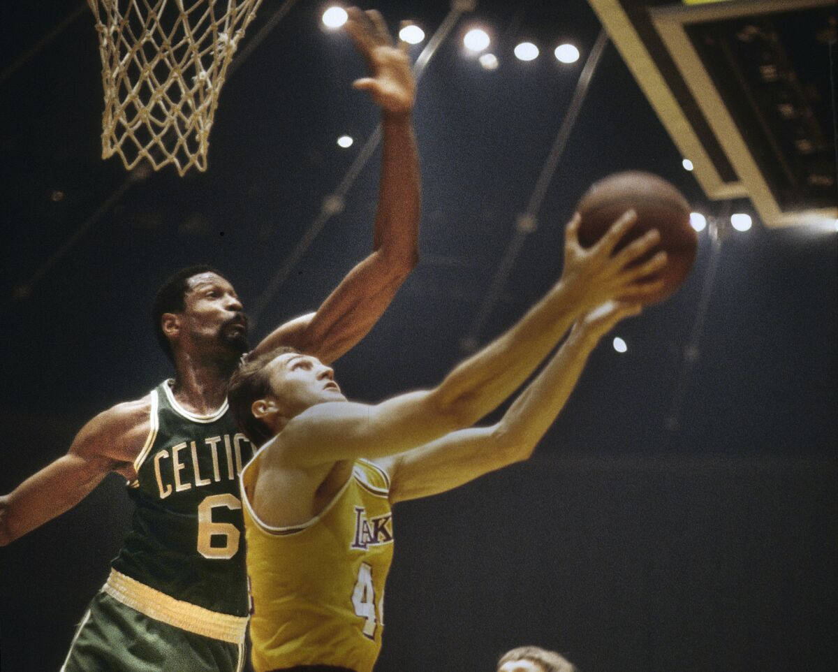 Jerry West Bill Russell Reverse Layup 1960s Nba Background