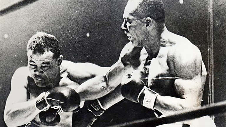 Jersey Joe Walcott Hits Joe Louis
