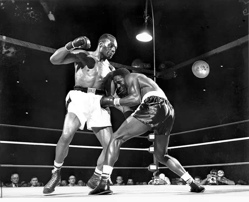 Jersey Joe Walcott's Knock-out Punch To Ezzard Charles Background