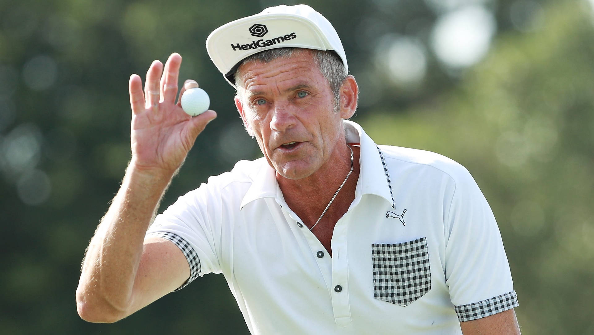 Jesper Parnevik Holding Golf Ball Background