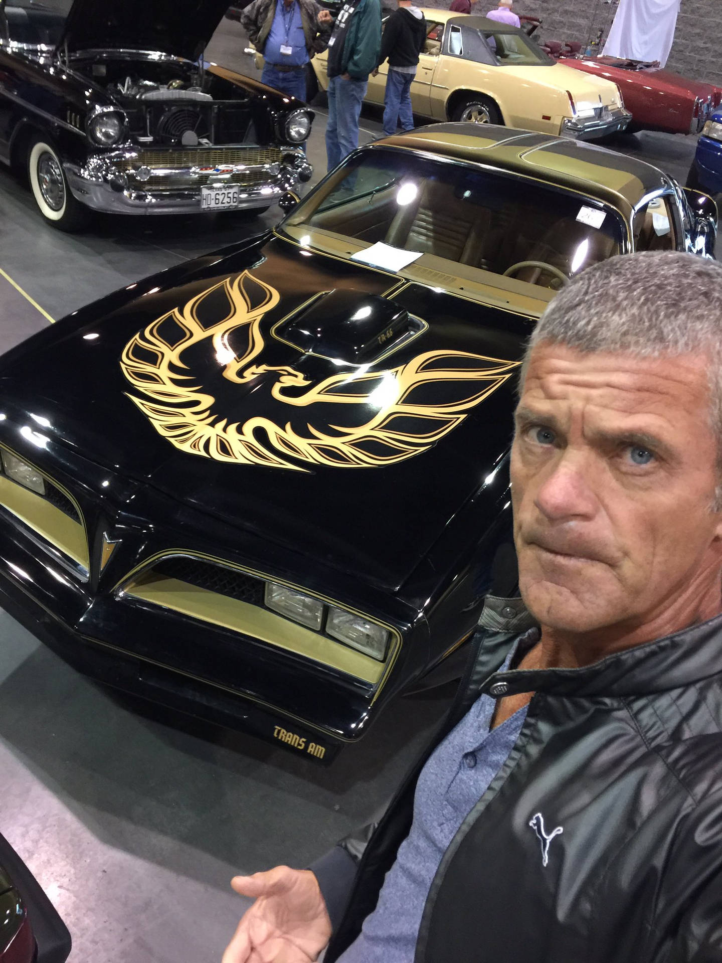 Jesper Parnevik Poses With His Vintage Pontiac Firebird Car