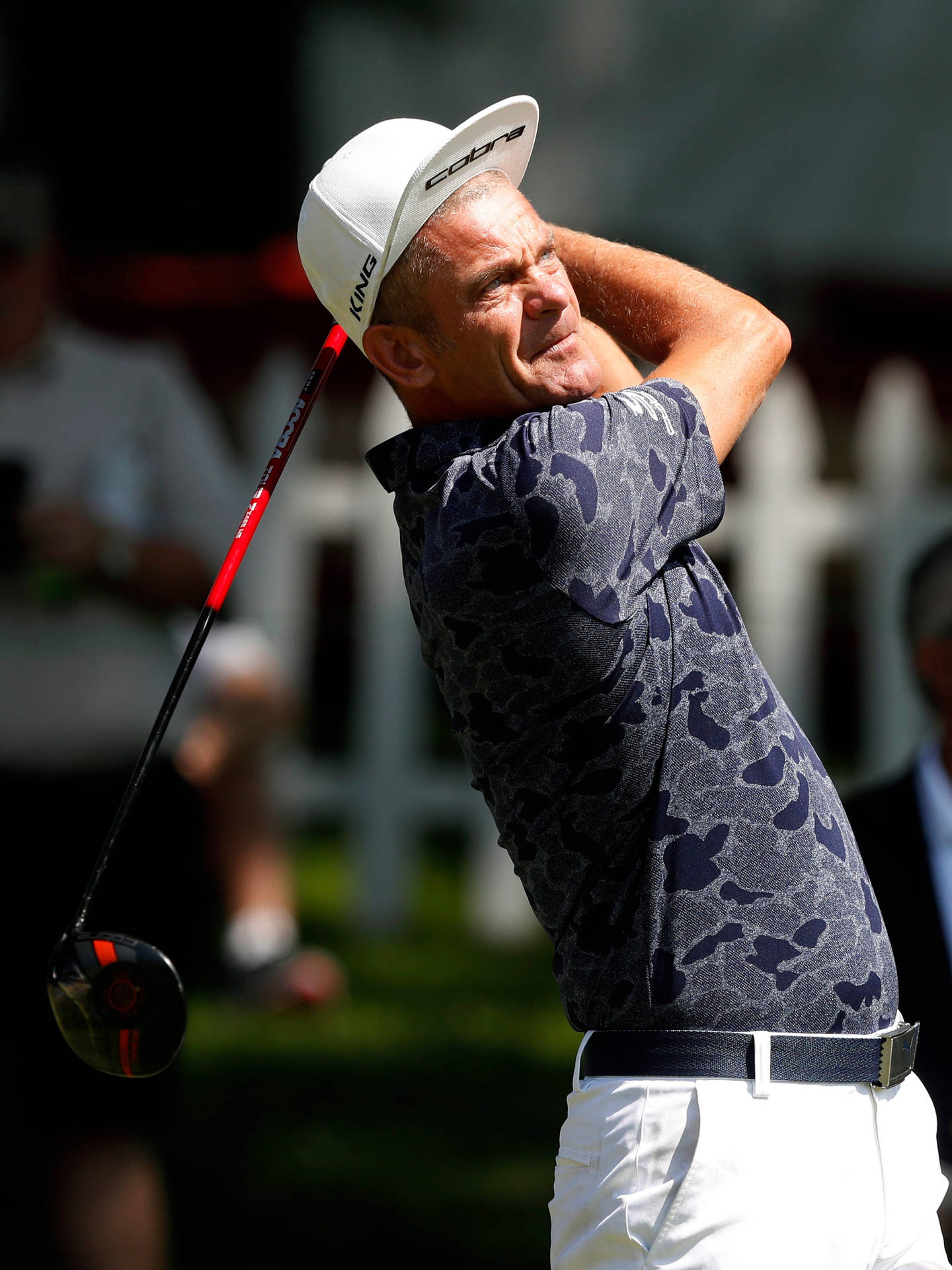 Jesper Parnevik Swinging Golf Club Background