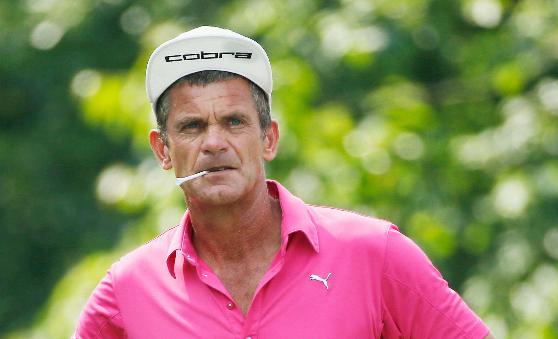 Jesper Parnevik Wearing Pink Puma Shirt Background