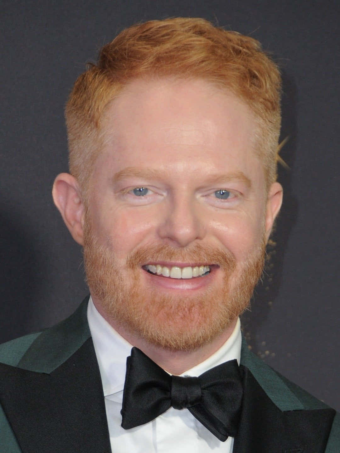 Jesse Tyler Ferguson Background