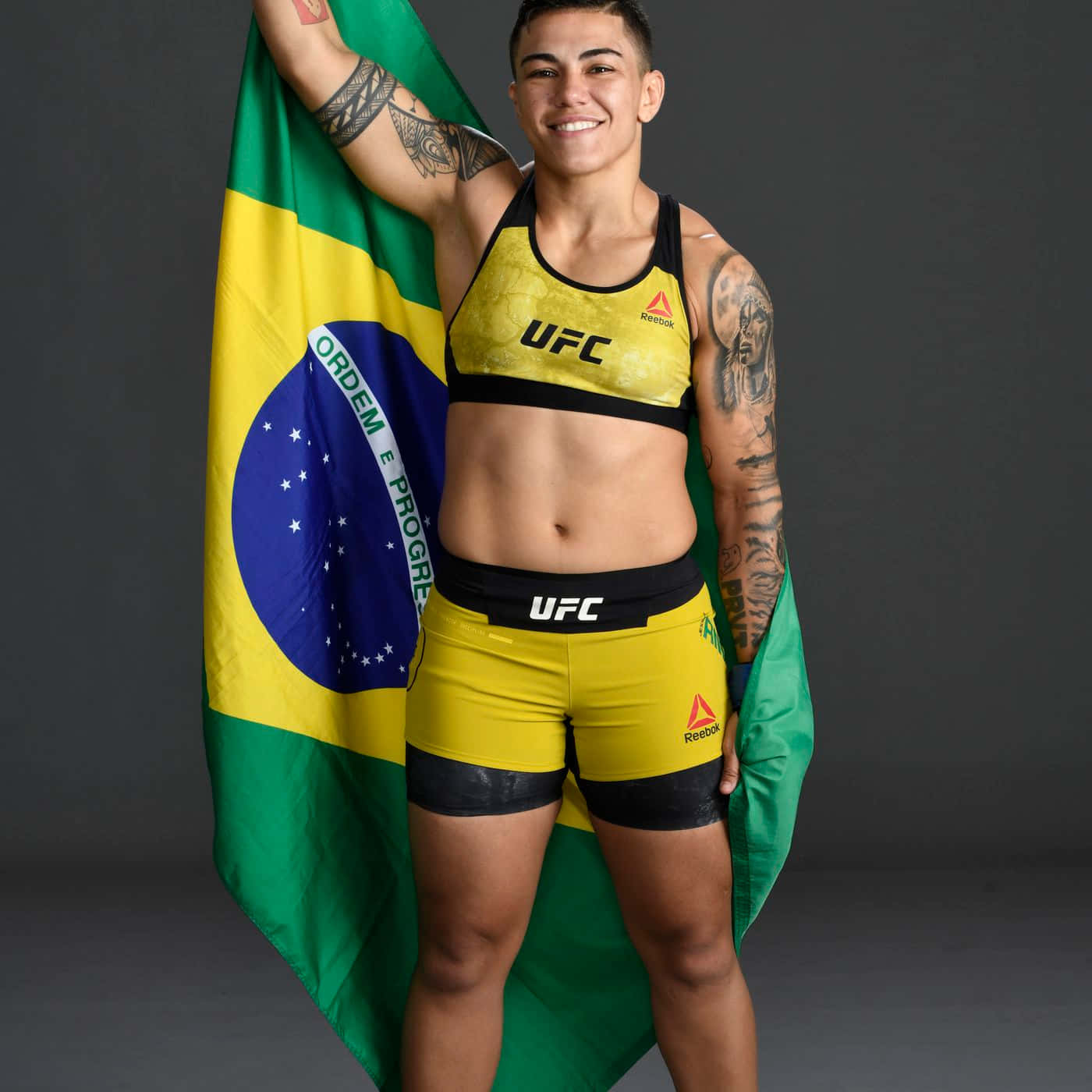 Jéssica Andrade Holding Brazilian Flag
