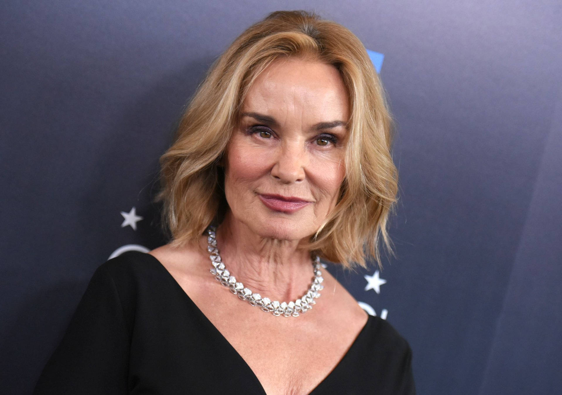 Jessica Lange With Stunning Necklace Background