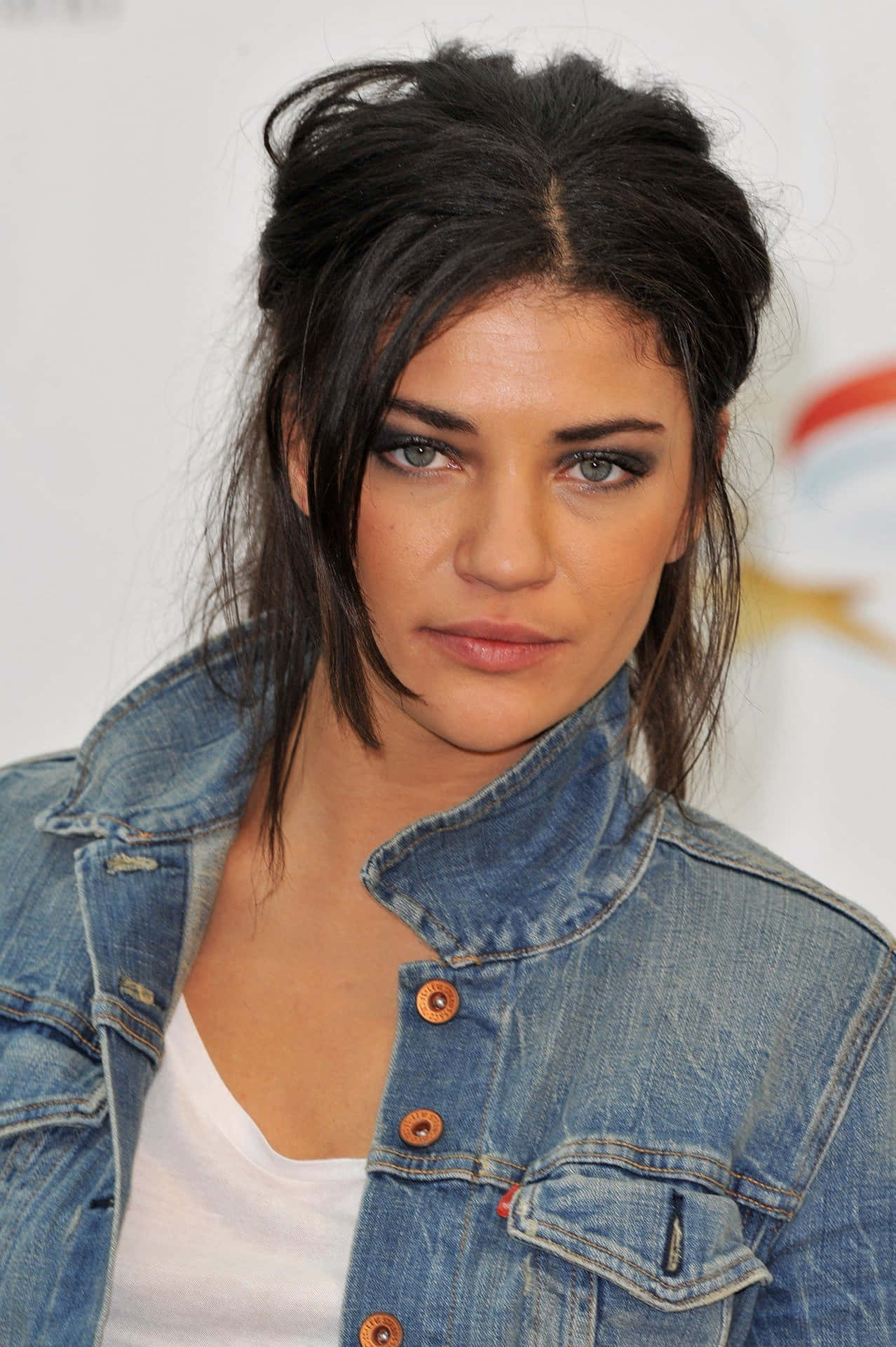 Jessica Szohr Smiling At An Event Background