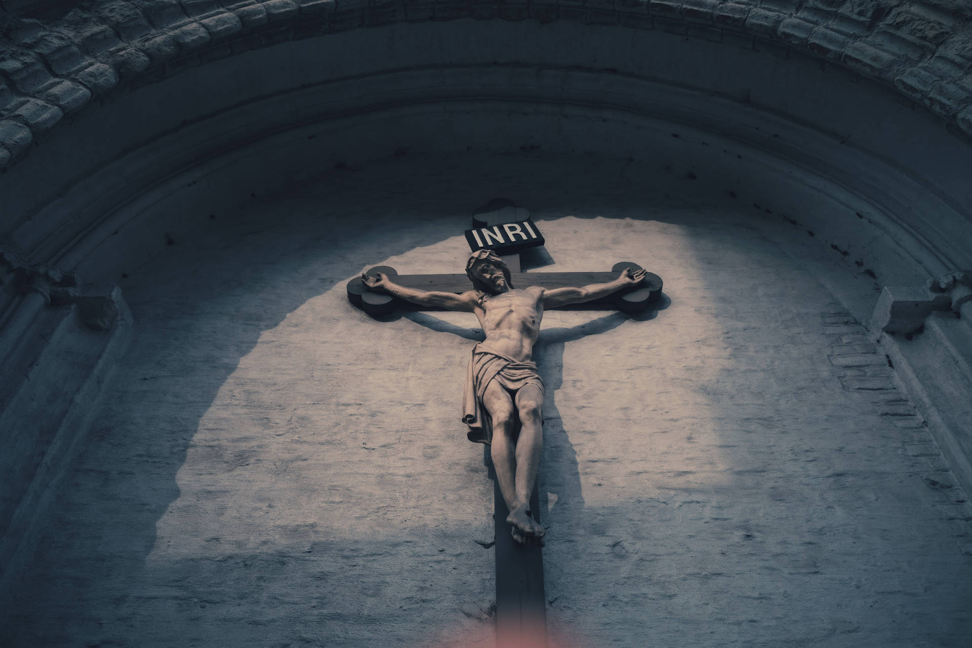 Jesus On Cross Outside Church Wall Background