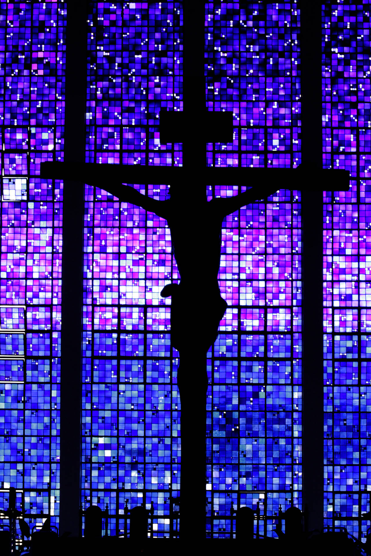 Jesus On Cross Silhouette Against Purple Window Background