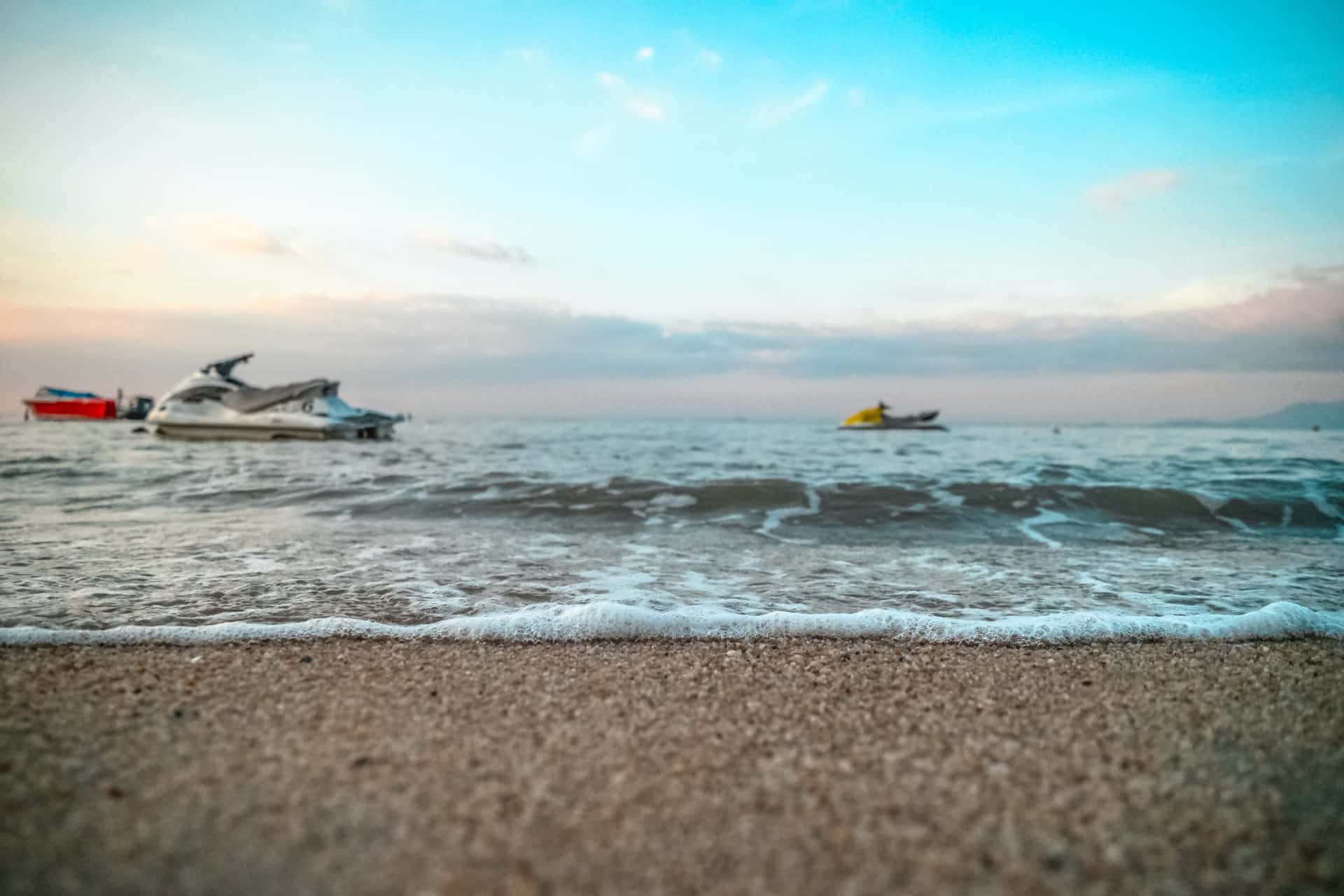 Jet Skis On The Shore Background