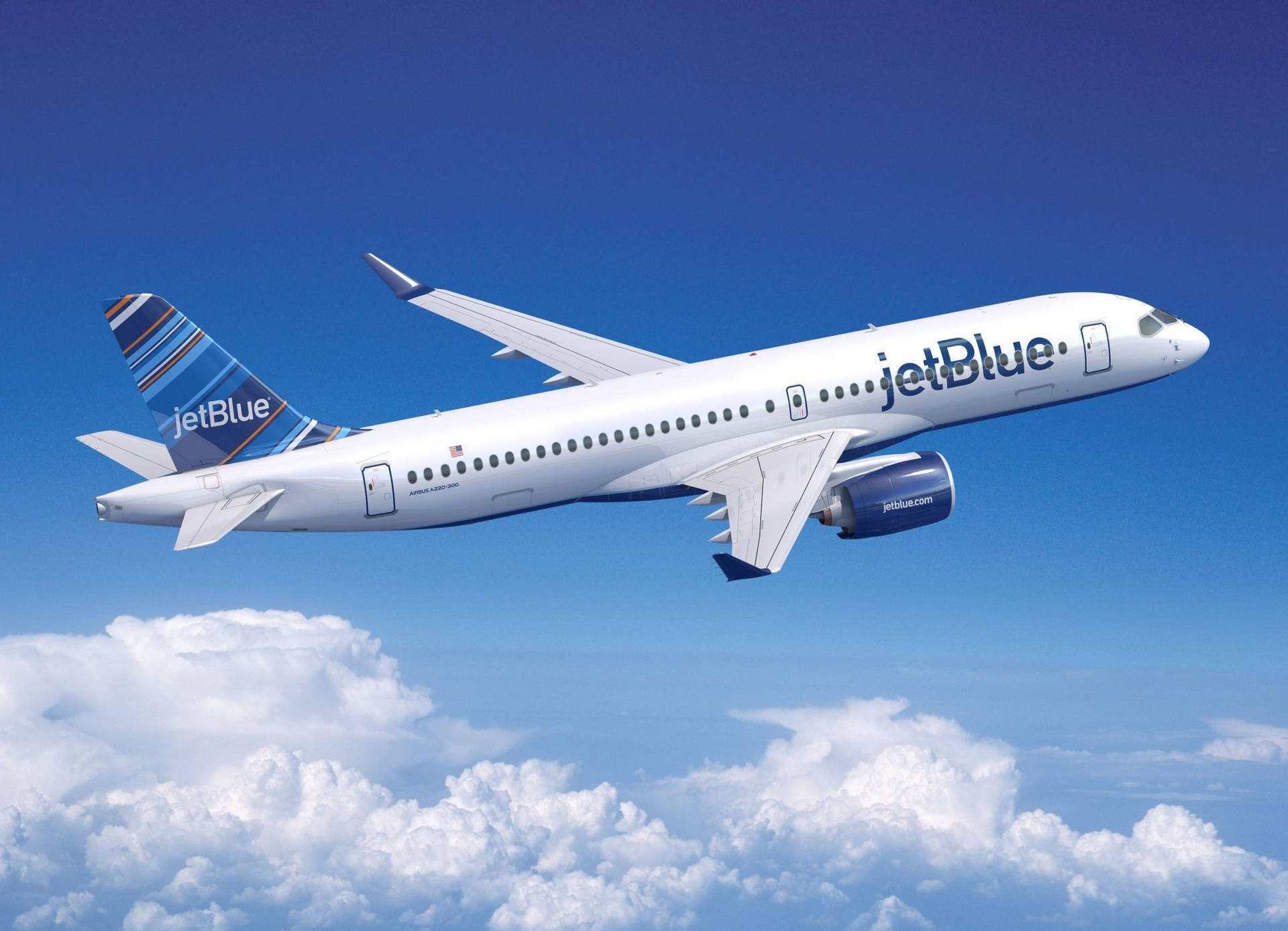 Jetblue Flight On Blue Cloudy Skies Background