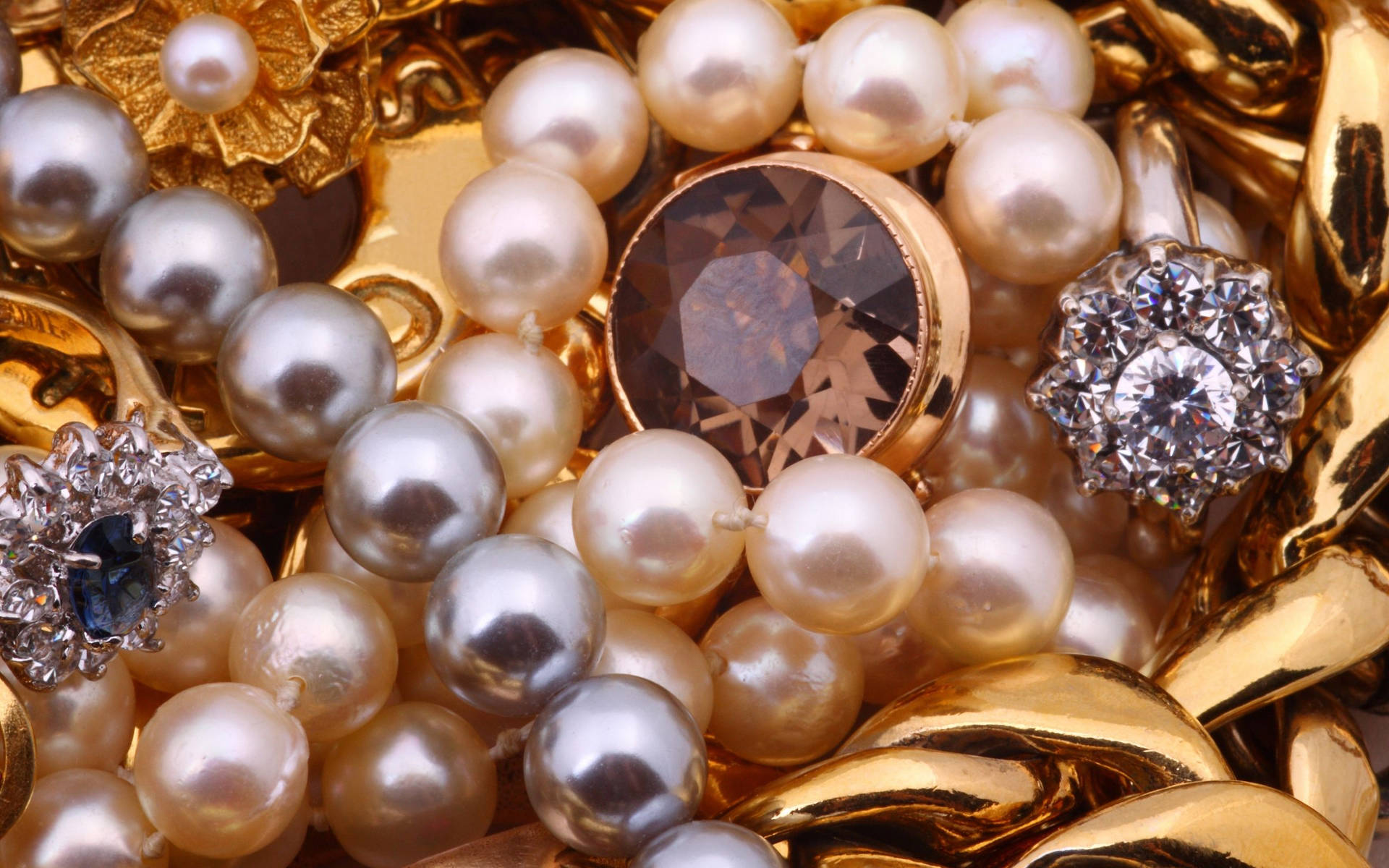 Jewelries With Different Colored Pearls Background
