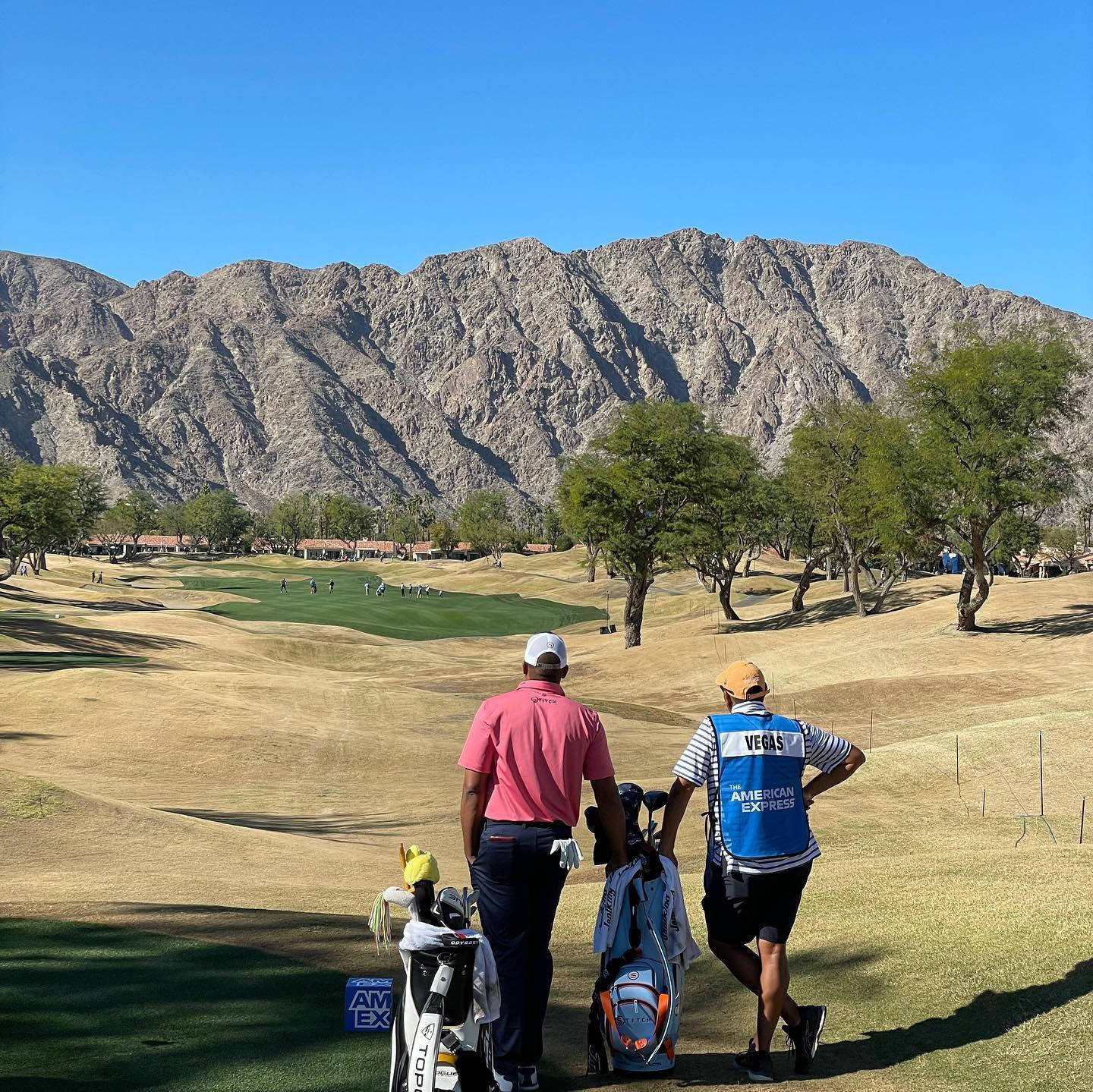 Jhonattan Vegas And Caddie Beautiful Mountains Background