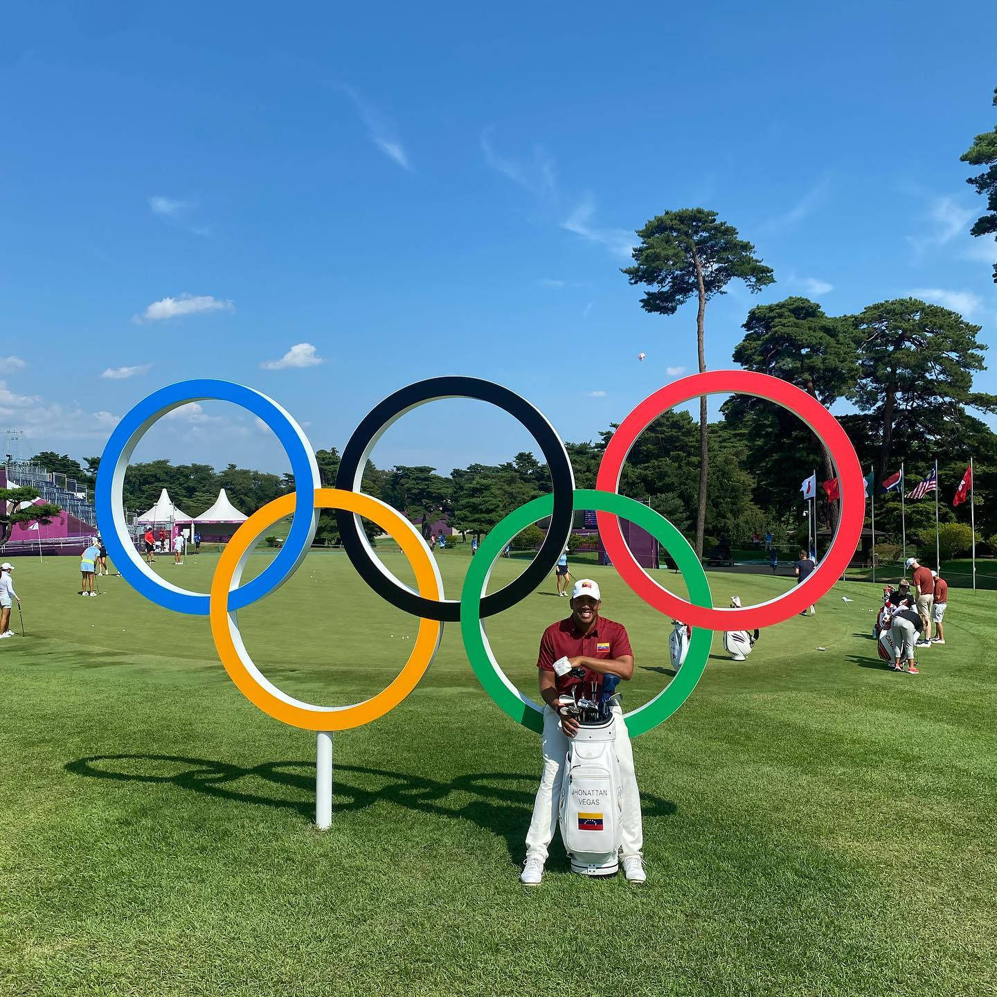 Jhonattan Vegas And Olympics Logo Background