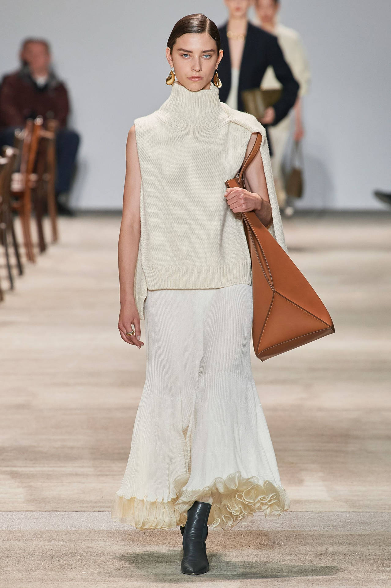 Jil Sander Sleeveless Turtleneck Background