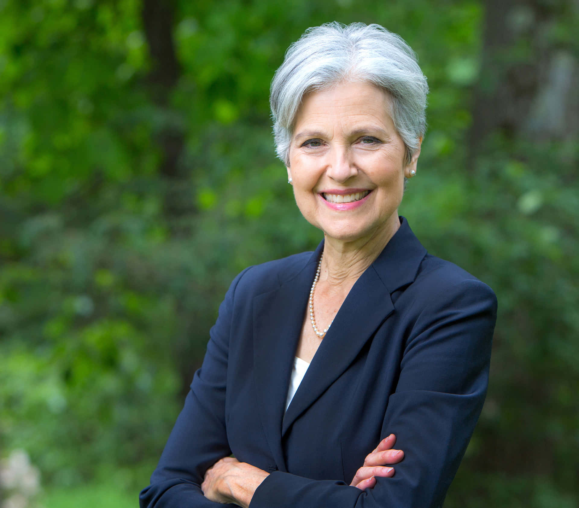 Jill Stein Arms Crossed Pose Background