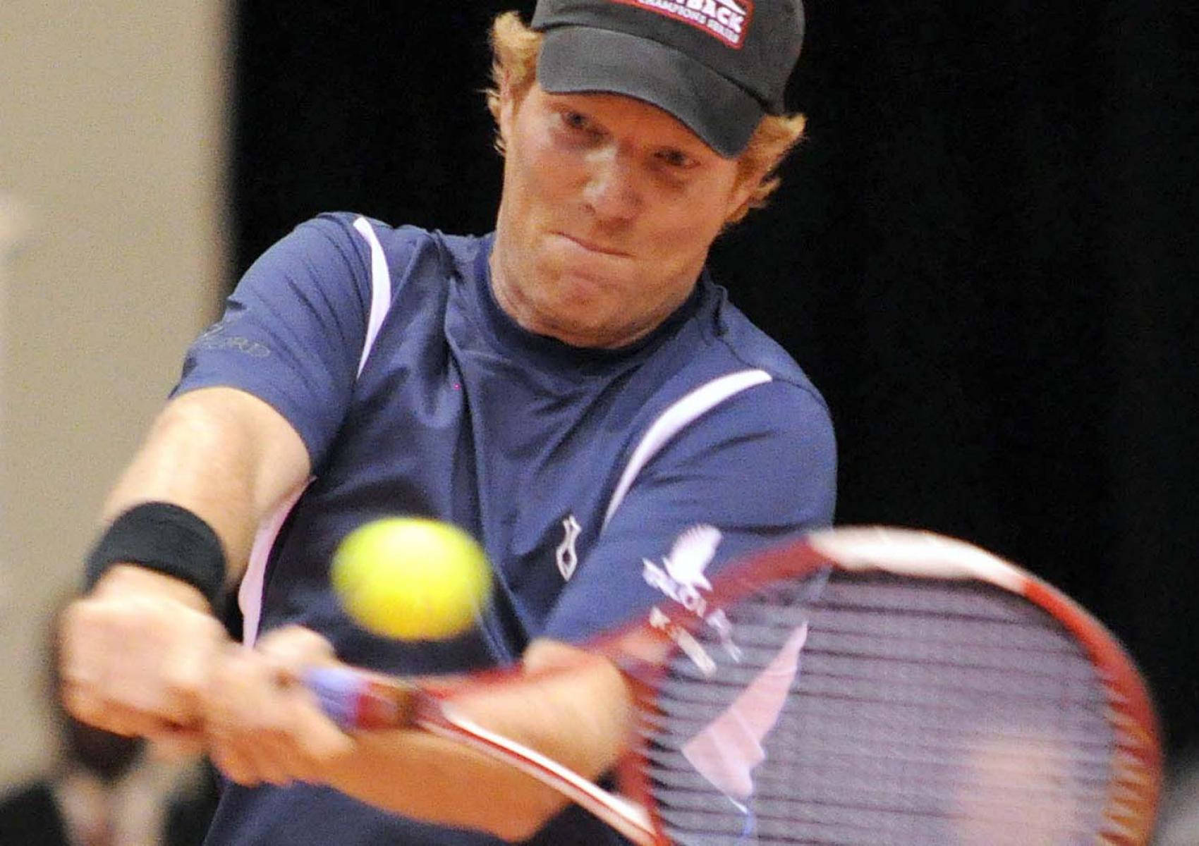 Jim Courier Striking Tennis Game Background