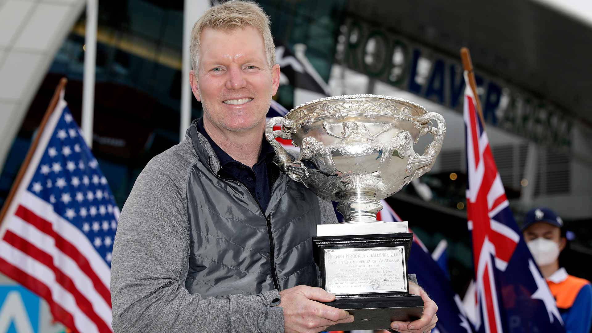 Jim Courier Winning Trophy Background