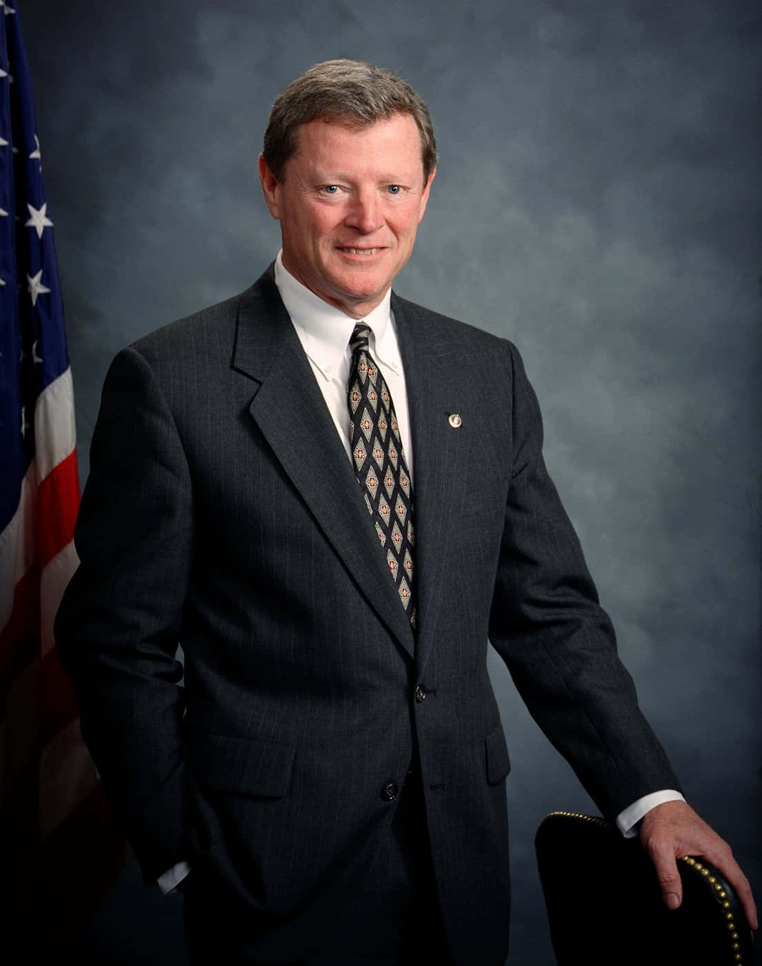 Jim Inhofe Formal Portrait Standing Background