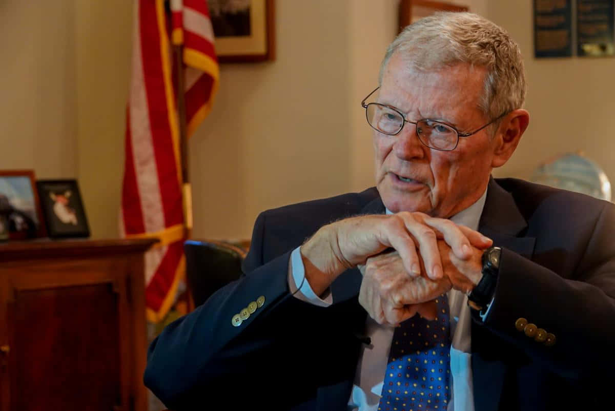 Jim Inhofe In His Office Background