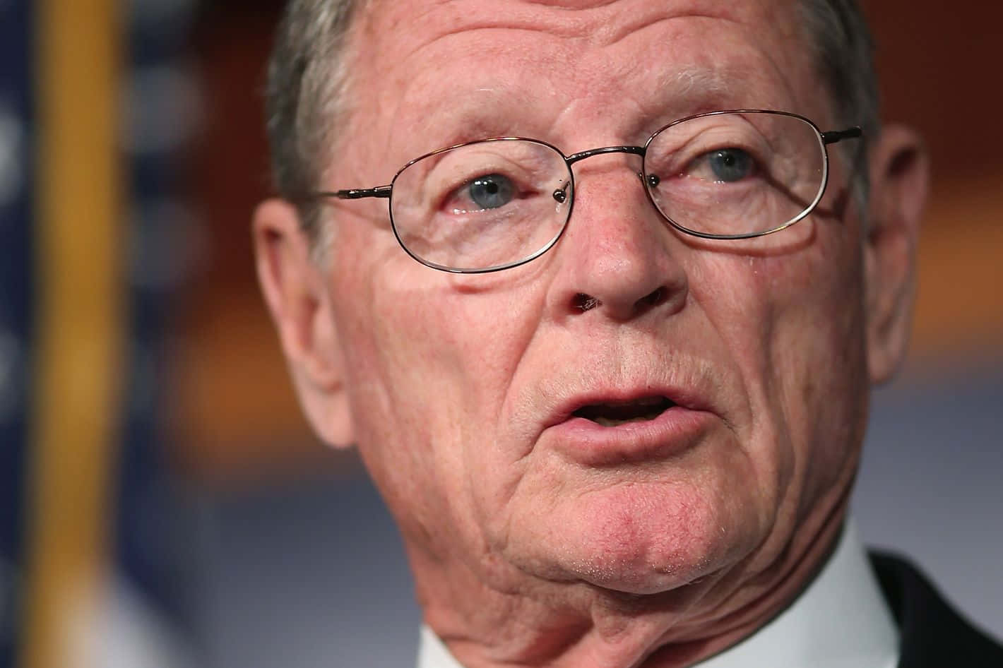 Jim Inhofe With His Glasses Background