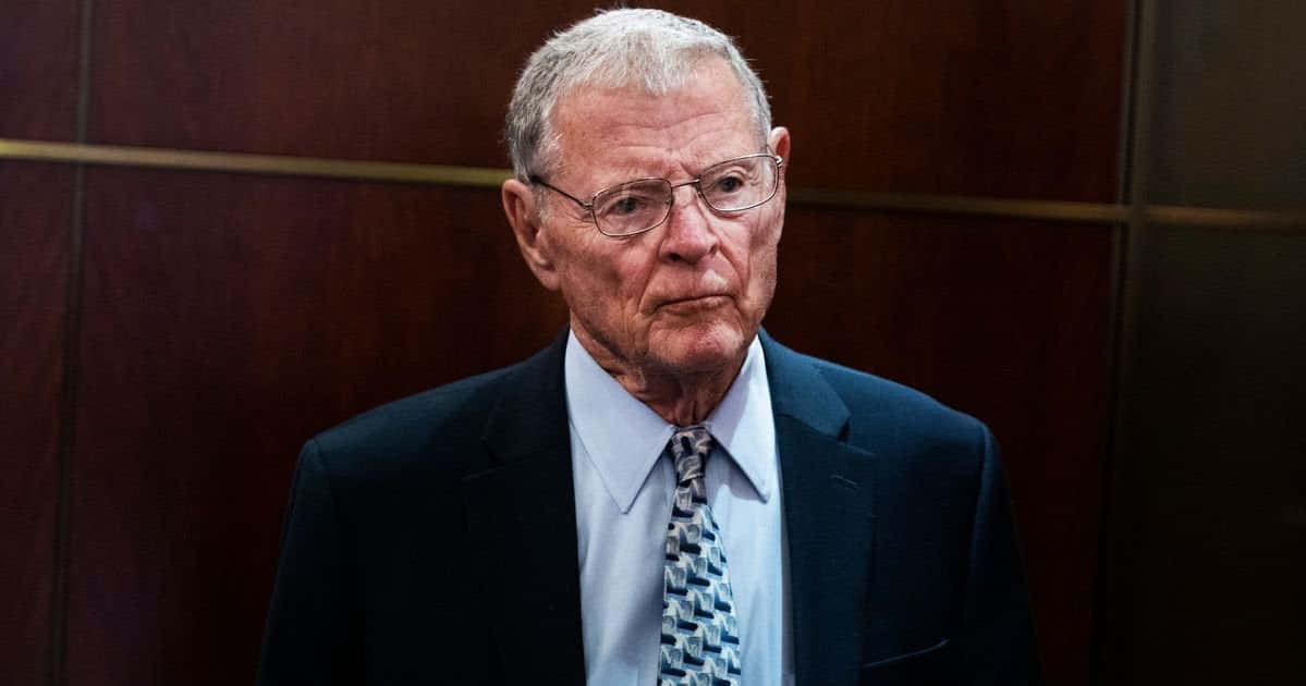 Jim Inhofe With Wooden Wall Background Background