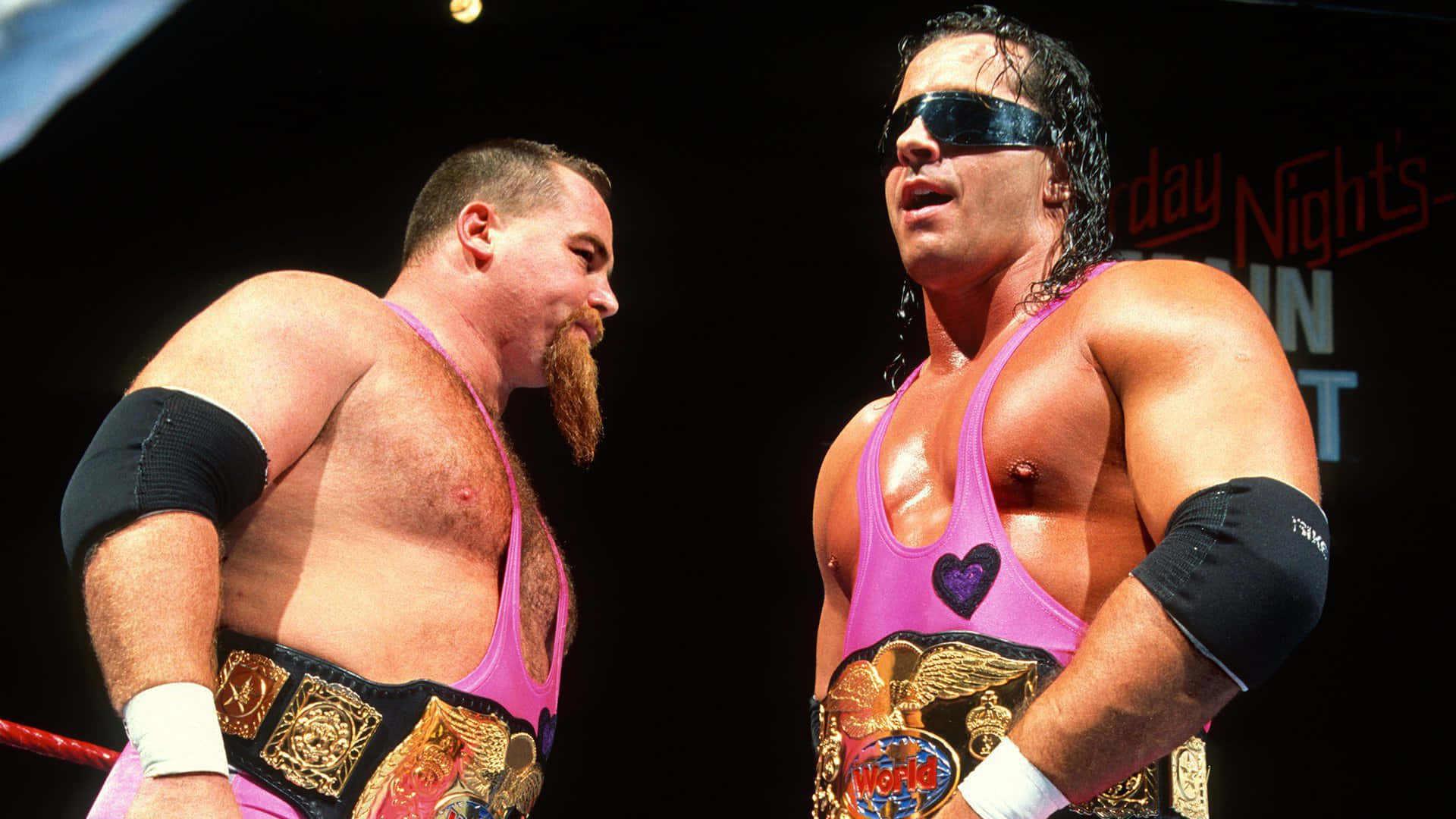 Jim Neidhart Standing Near Bret Hart Background