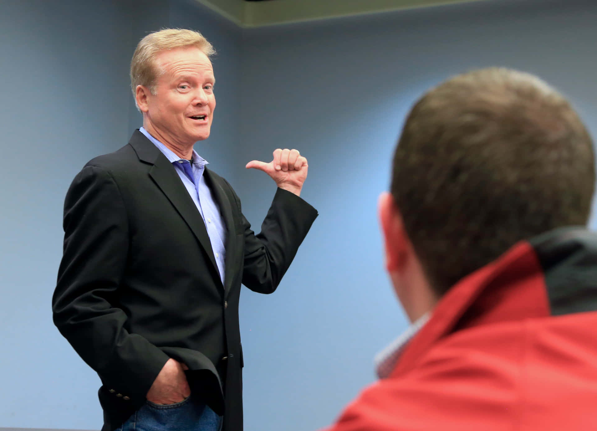 Jim Webb Pointing At Himself Background