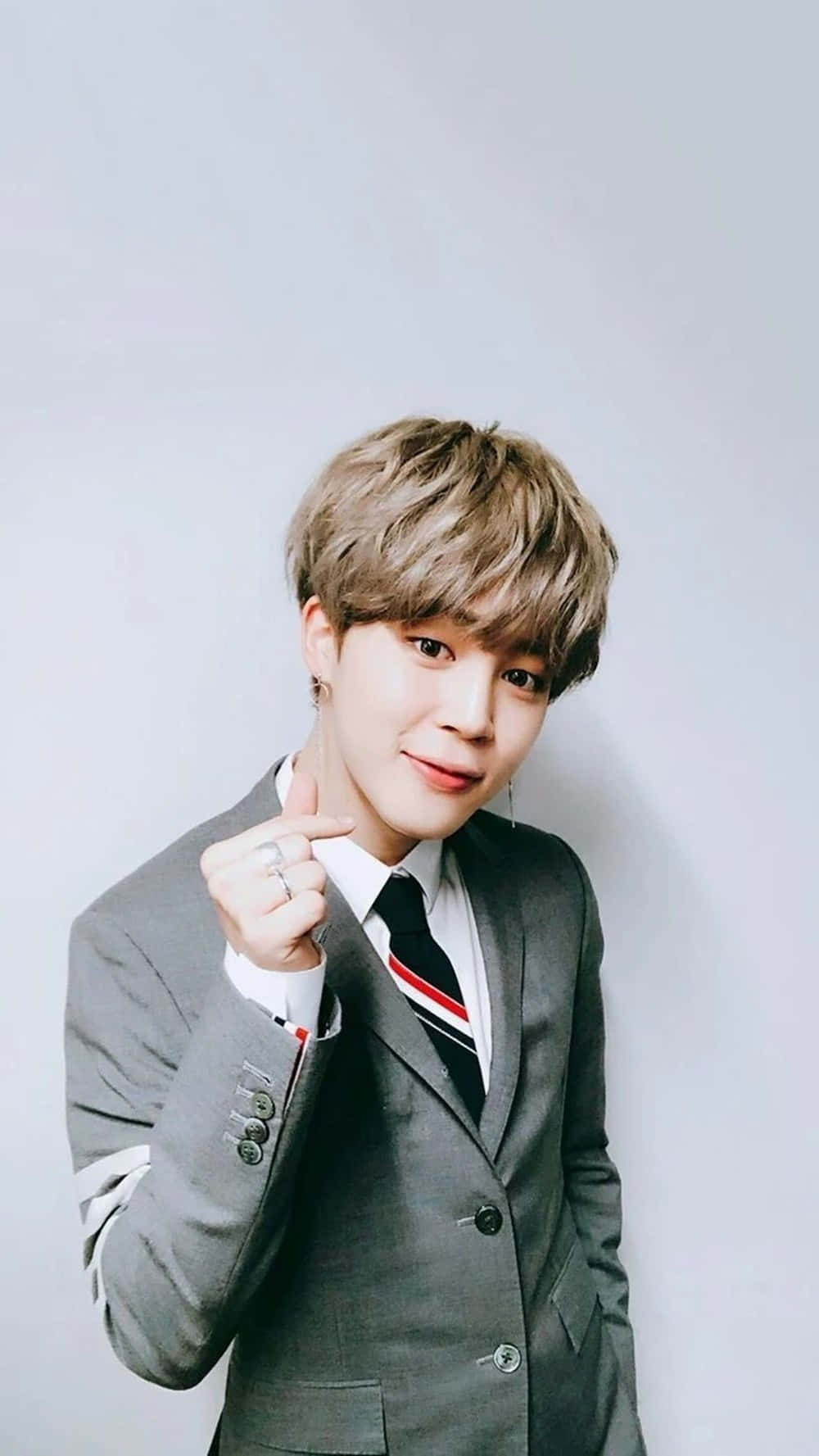 Jimin Bts Finger Heart Grey Suit Background