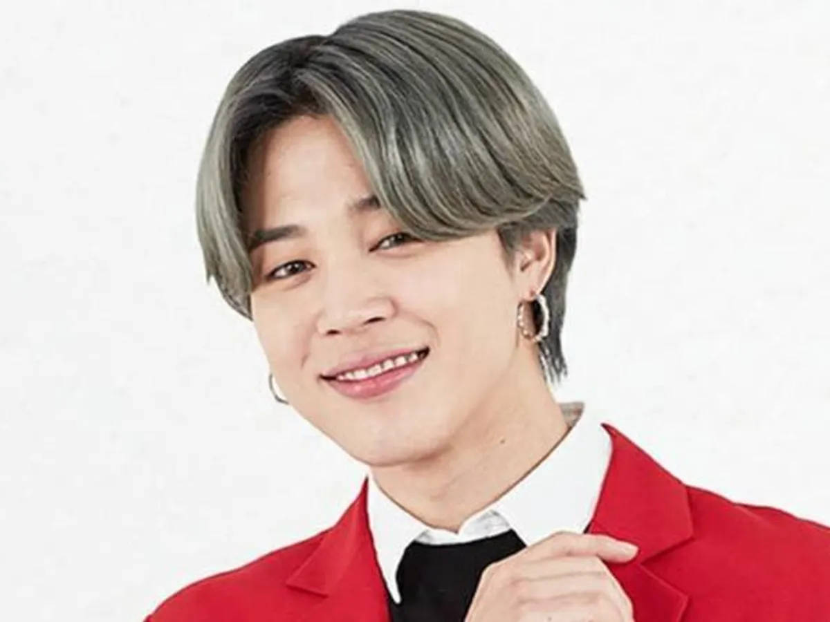 Jimin From Bts Wears Red Suit Background