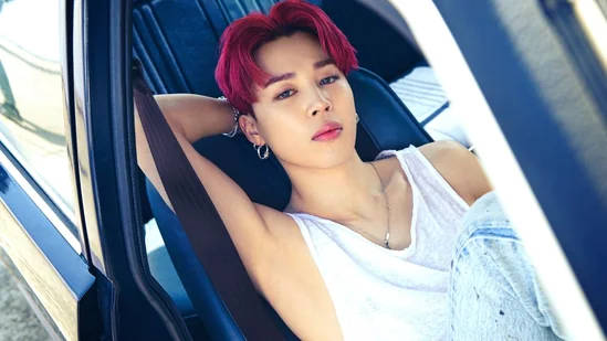 Jimin Of Bts Posing In A Car Background