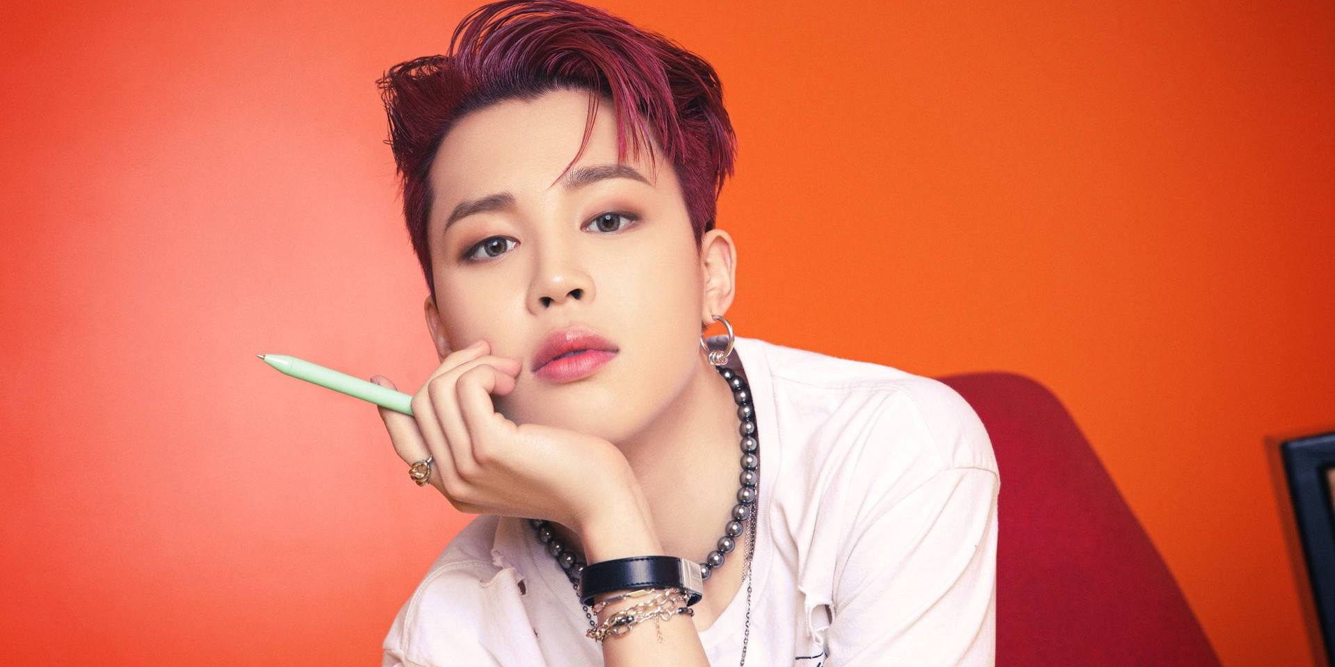 Jimin Of Bts With A Pen Background