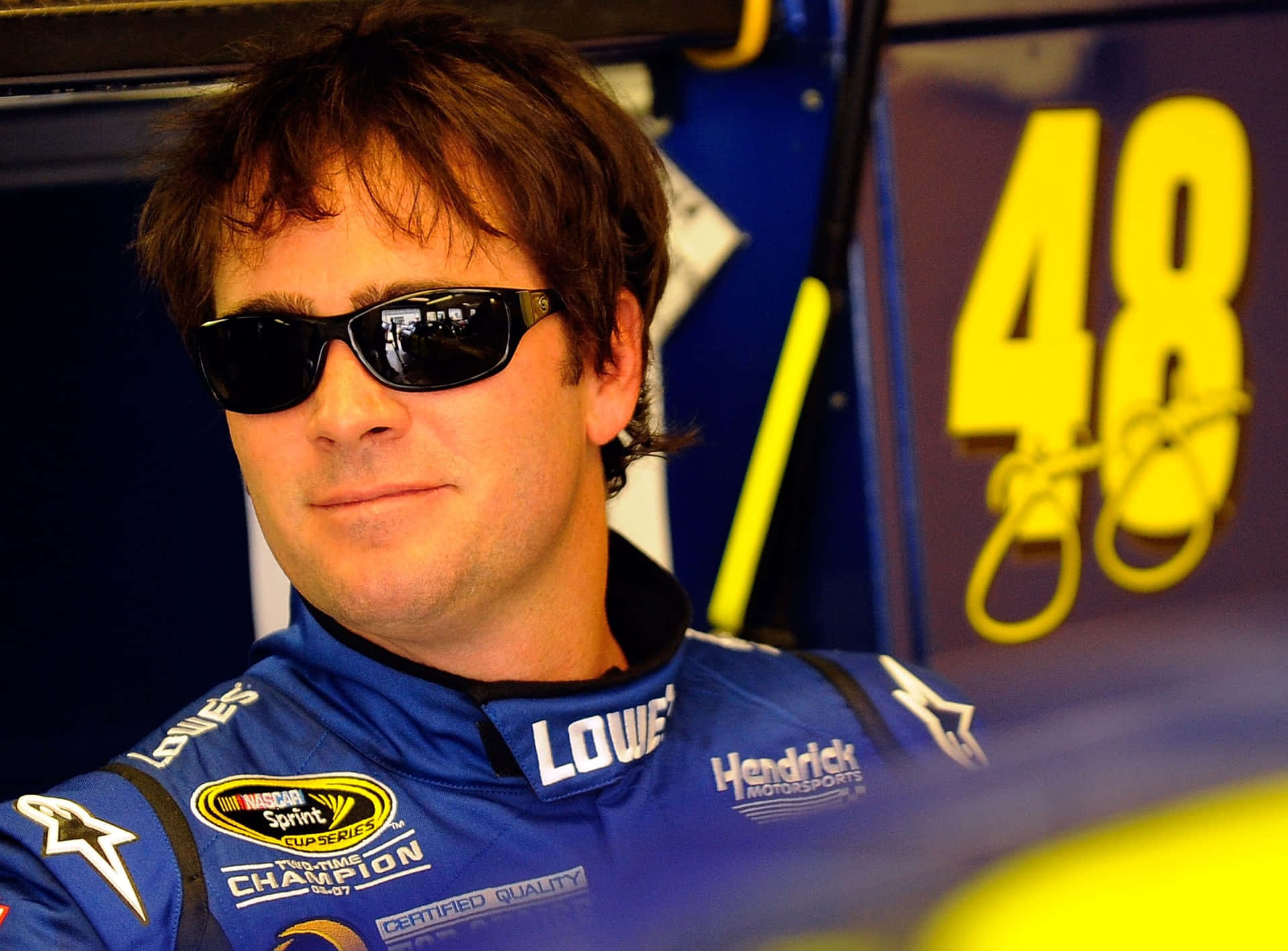 Jimmie Johnson Racing At Full Speed Background