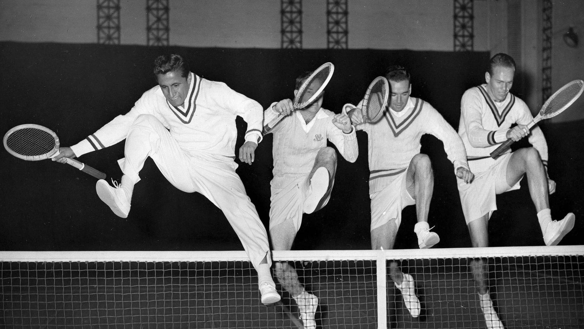 Jimmy Connors And Teammates Jump Background