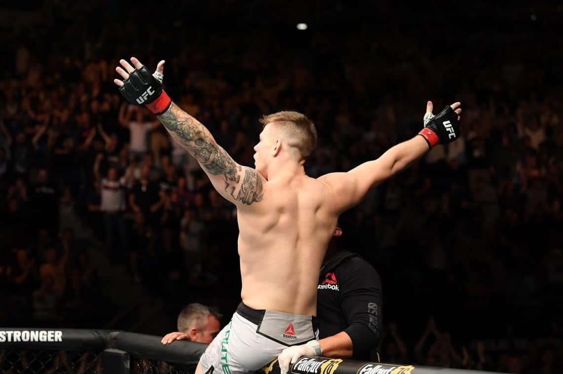 Jimmy Crute Cheering In The Ring Background