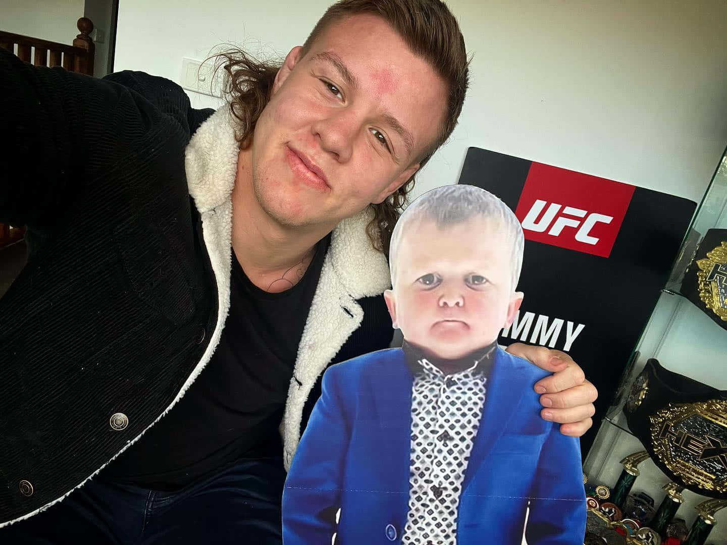 Jimmy Crute Posing With Cutout Of Hasbulla Background