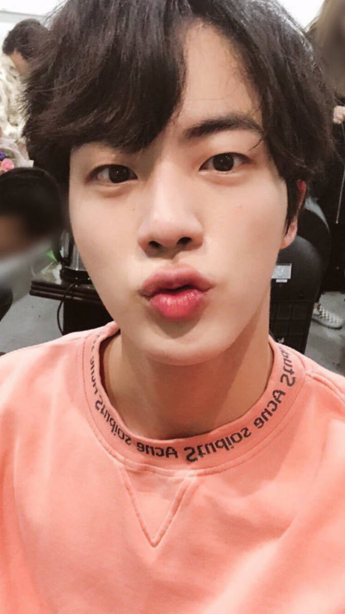 Jin Bts Cute Brown Hair And Salmon Shirt Background