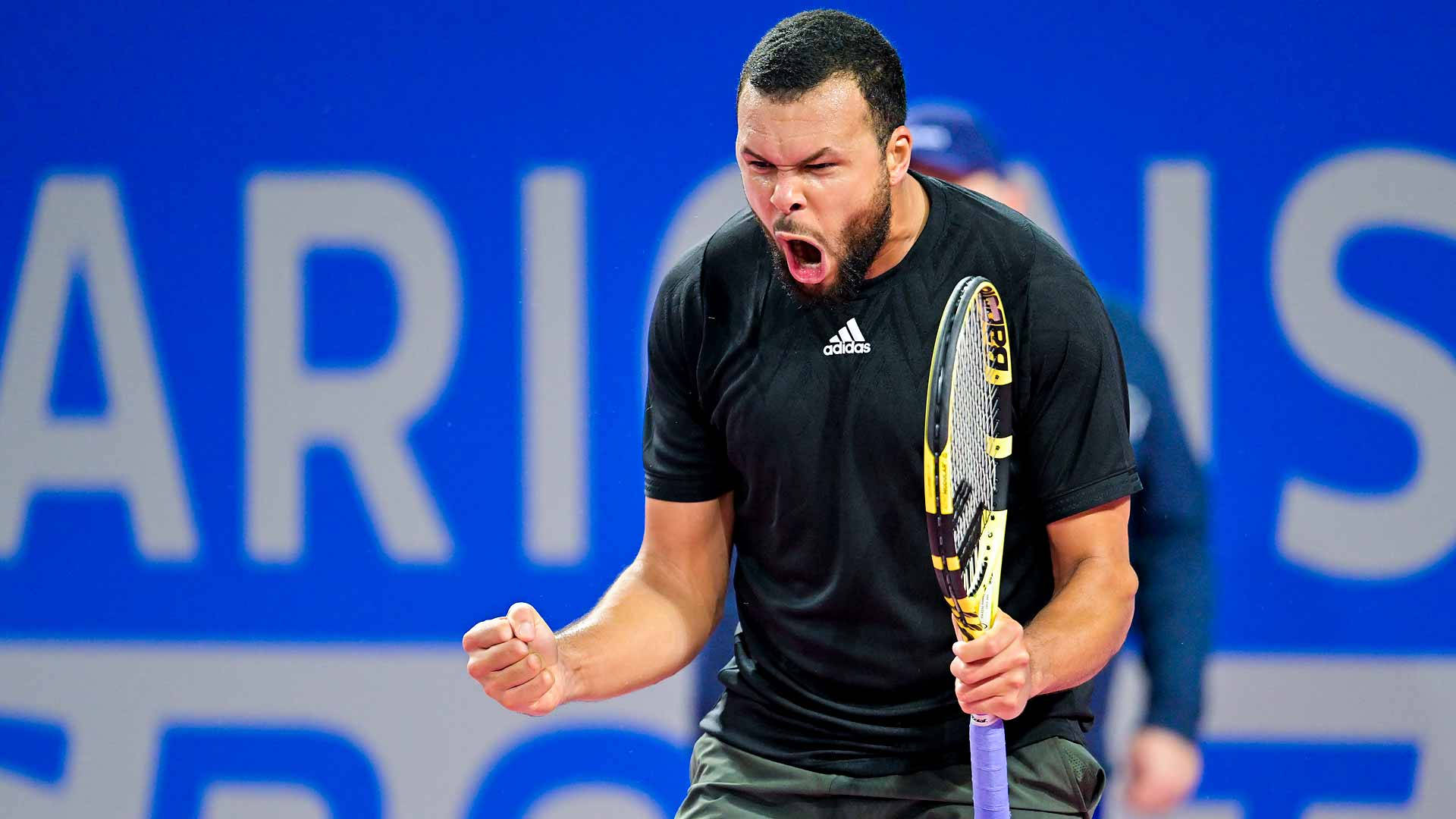 Jo-wilfried Tsonga Celebrating With A Fist Pump Background