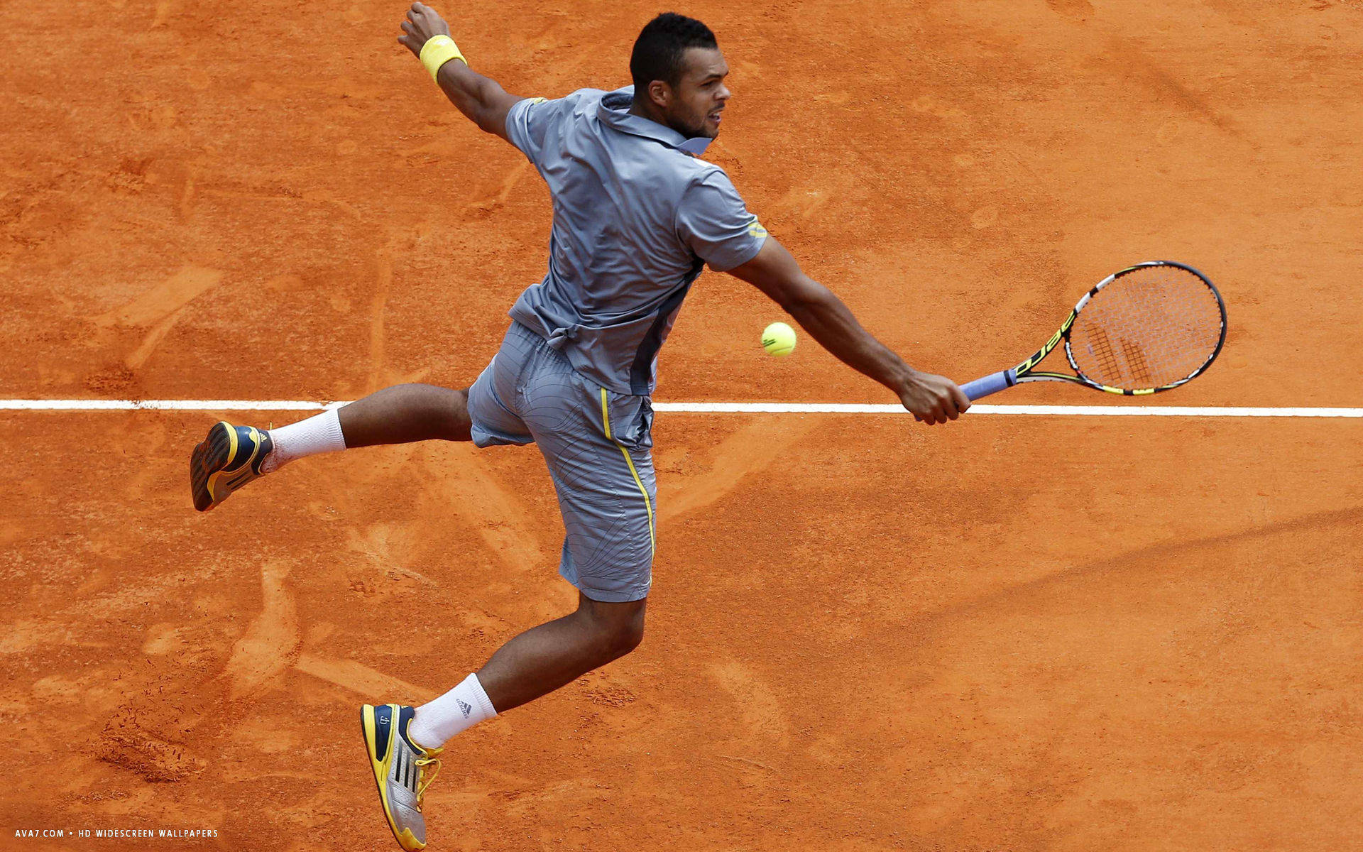 Jo-wilfried Tsonga Epic Mid-air Tennis Shot Background