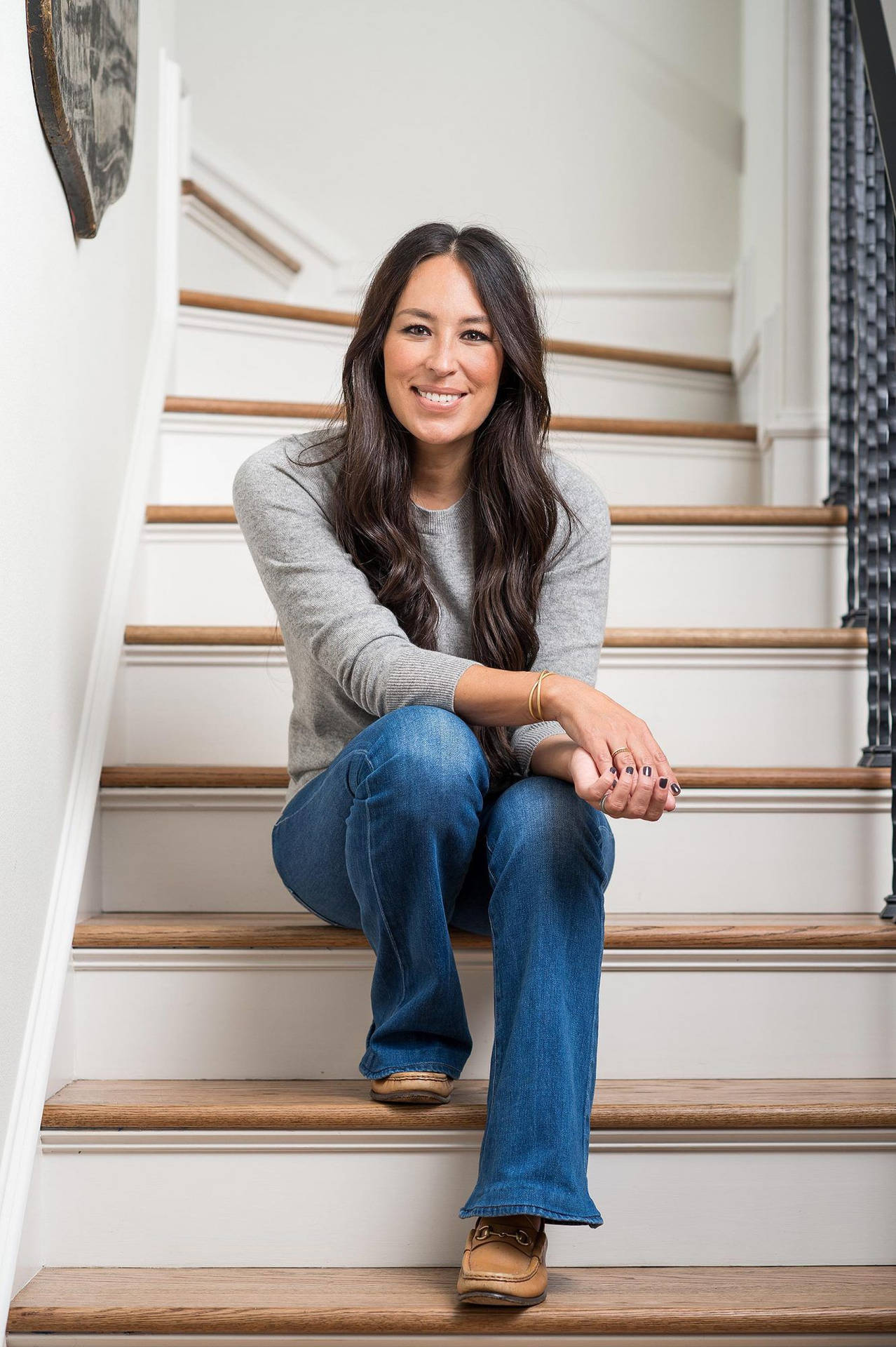 Joanna Gaines Sitting On Stairs Background