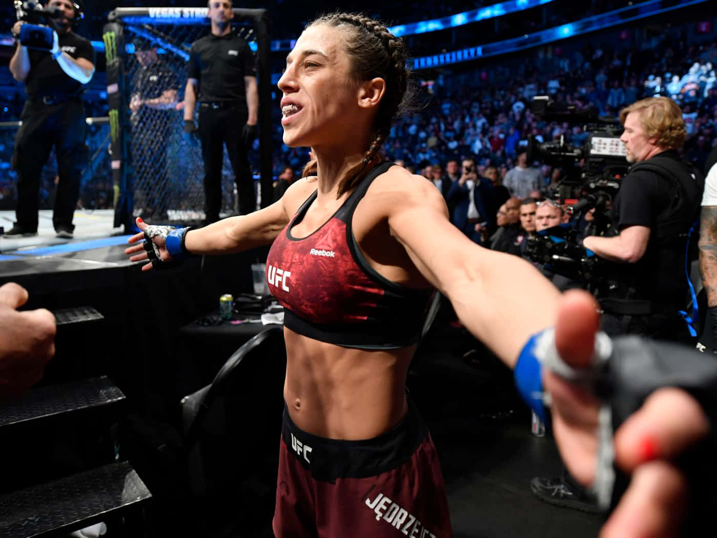 Joanna Jedrzejczyk Open Arm Background