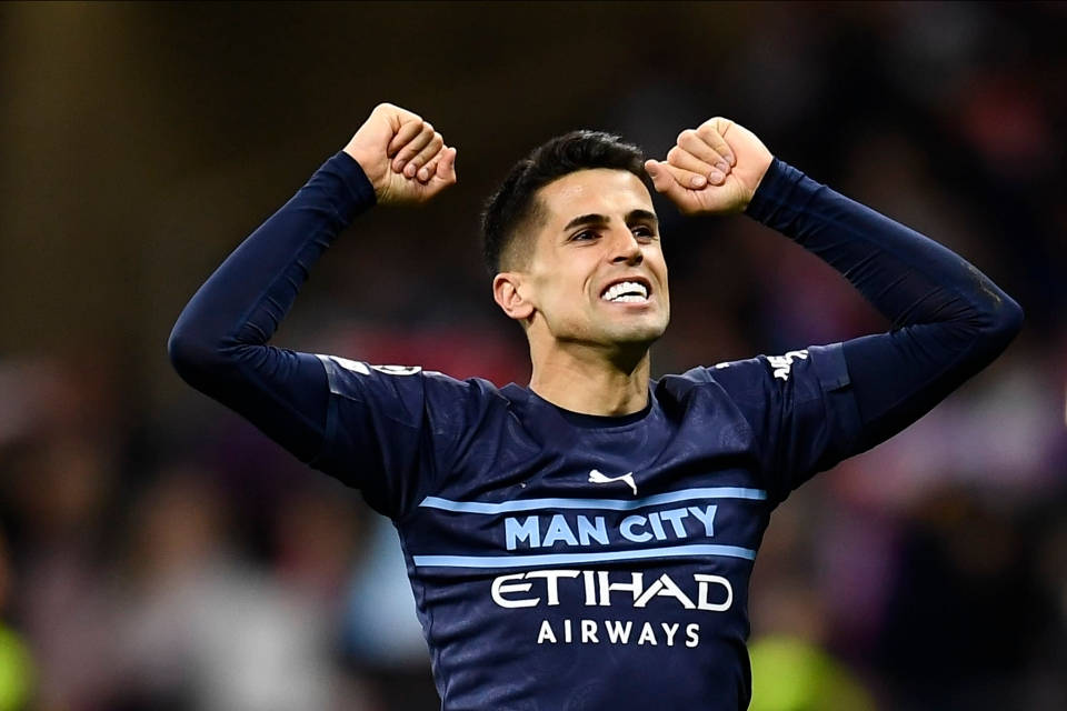 Joao Cancelo Celebrates During A Match