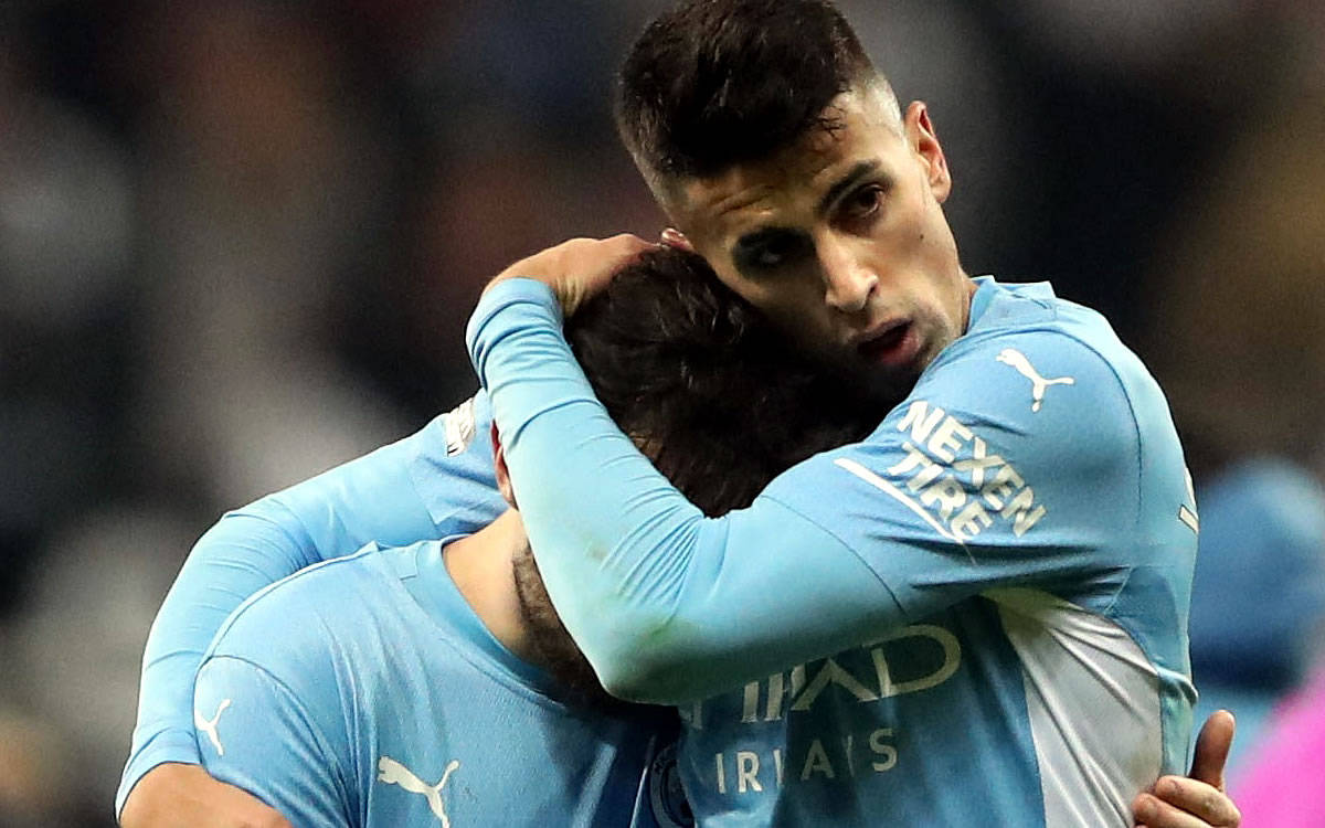 Joao Cancelo Embracing