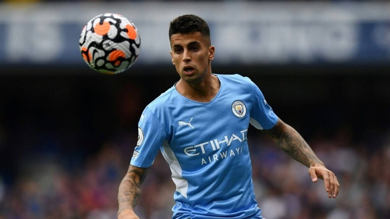 Joao Cancelo Eyes On The Ball Background